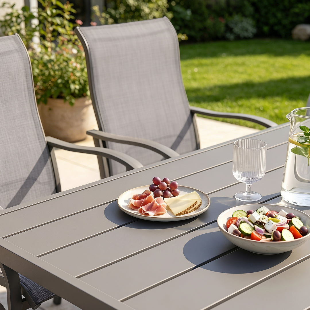 7-Piece Outdoor Textilene Dining Set with Umbrella Hole, Swivel Design